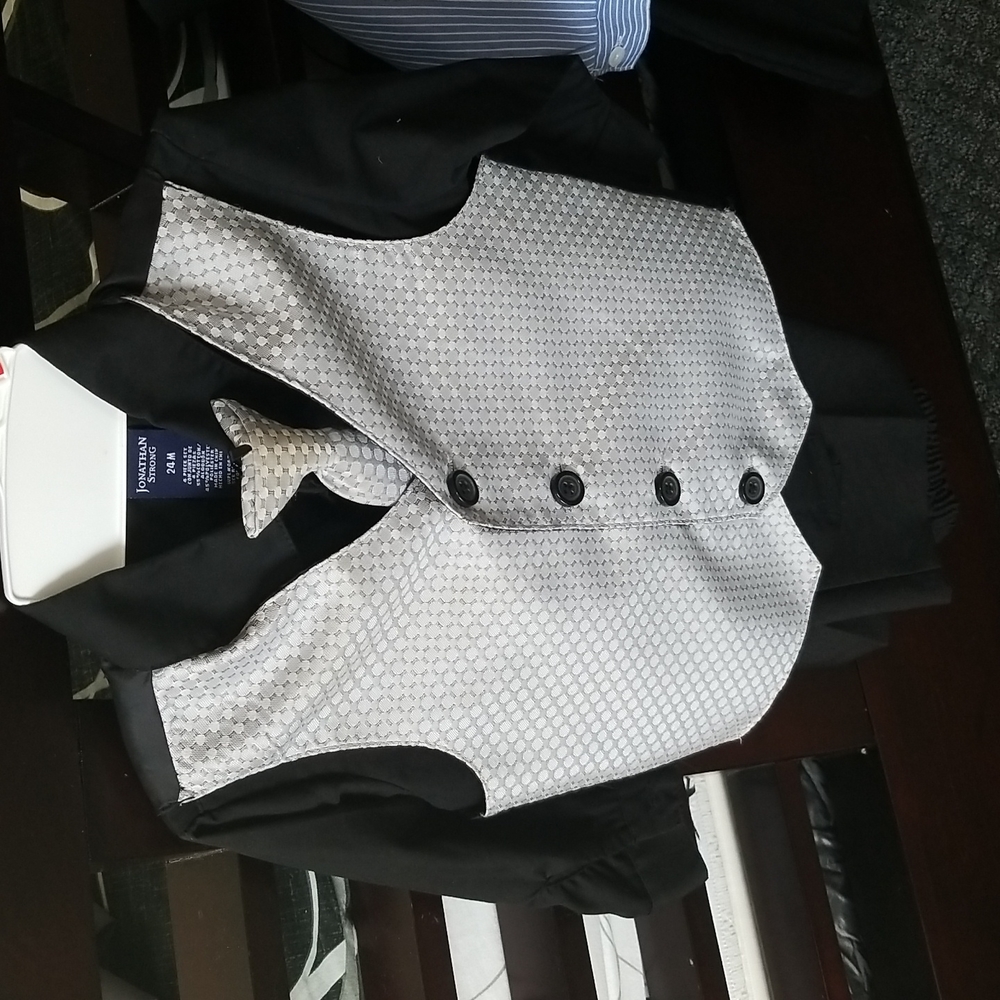 4 piece silver vest with black collared shirt